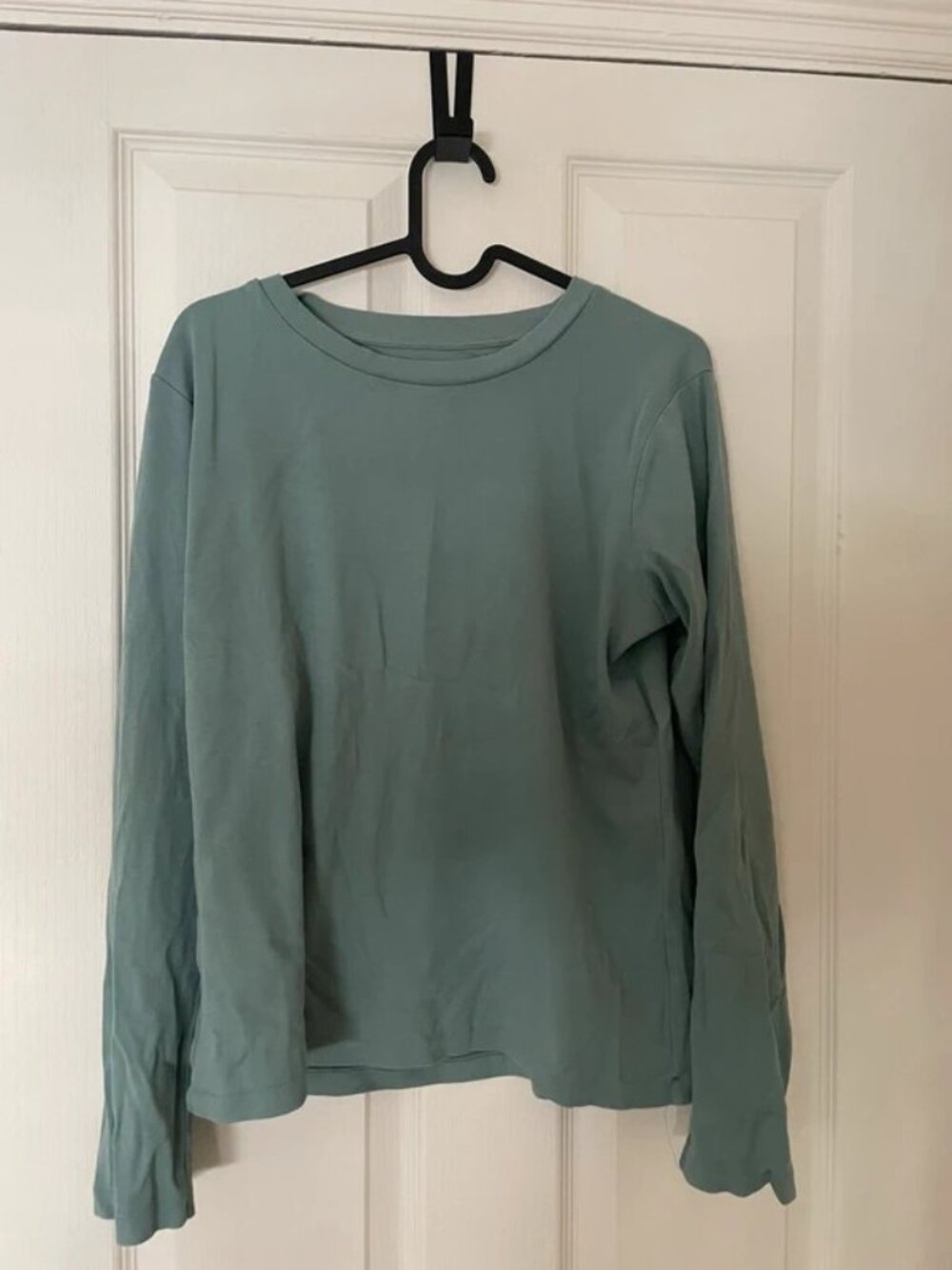 blue long sleeved top